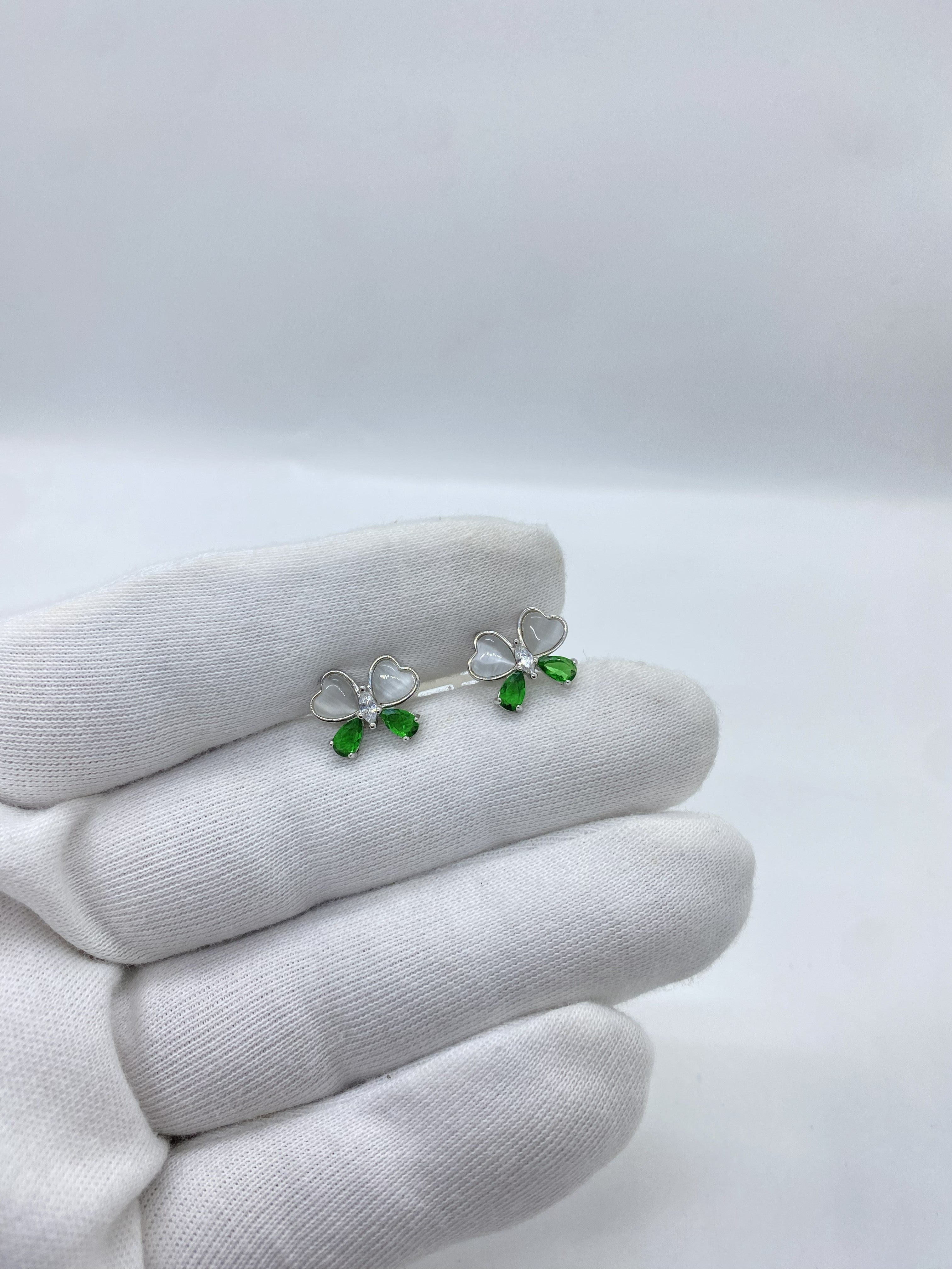 Delicate heart shapped butterfly green and white earring