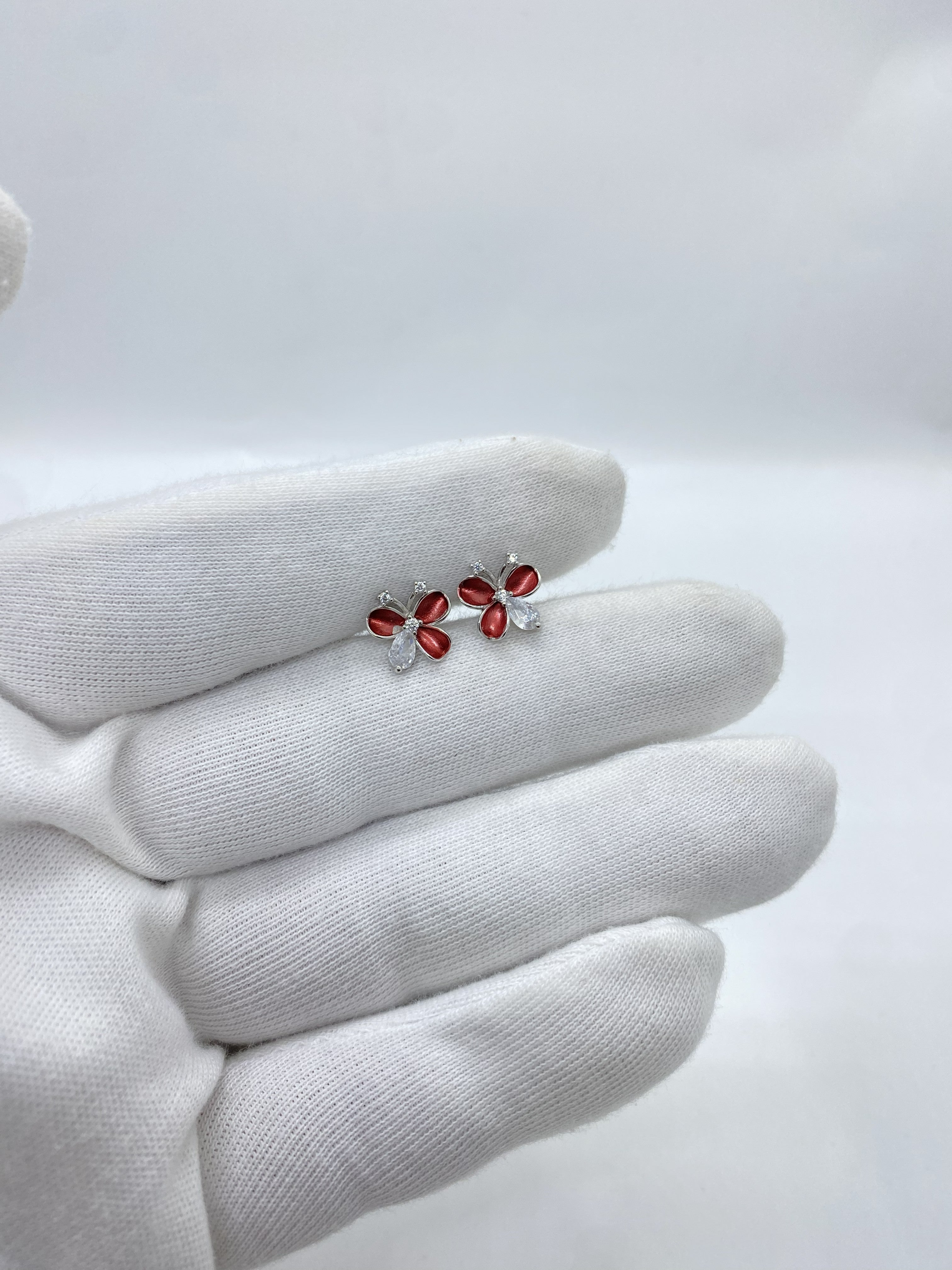 silver flower type butterfly earring