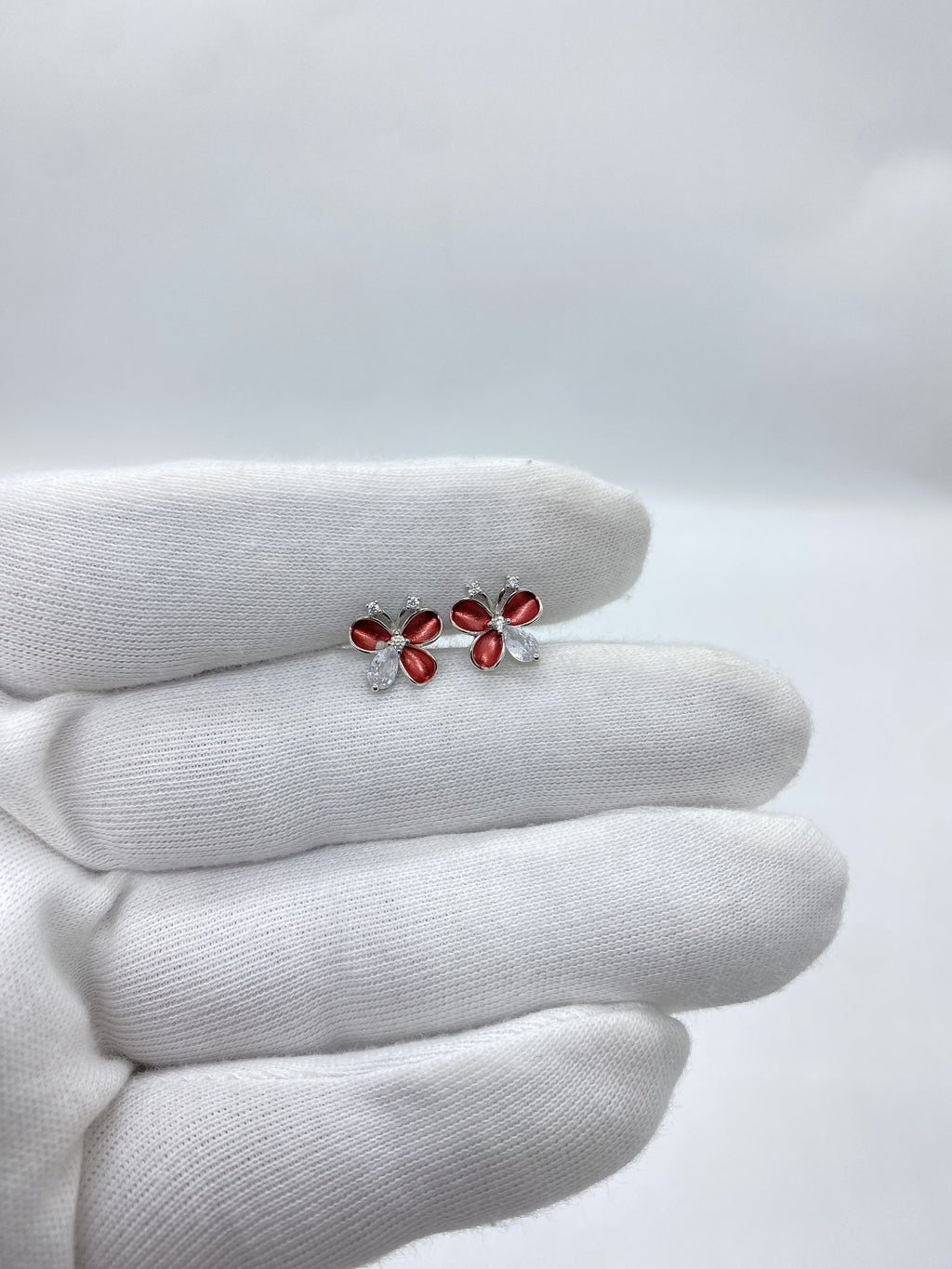 silver flower type butterfly earring