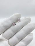 Earrings with pink petals