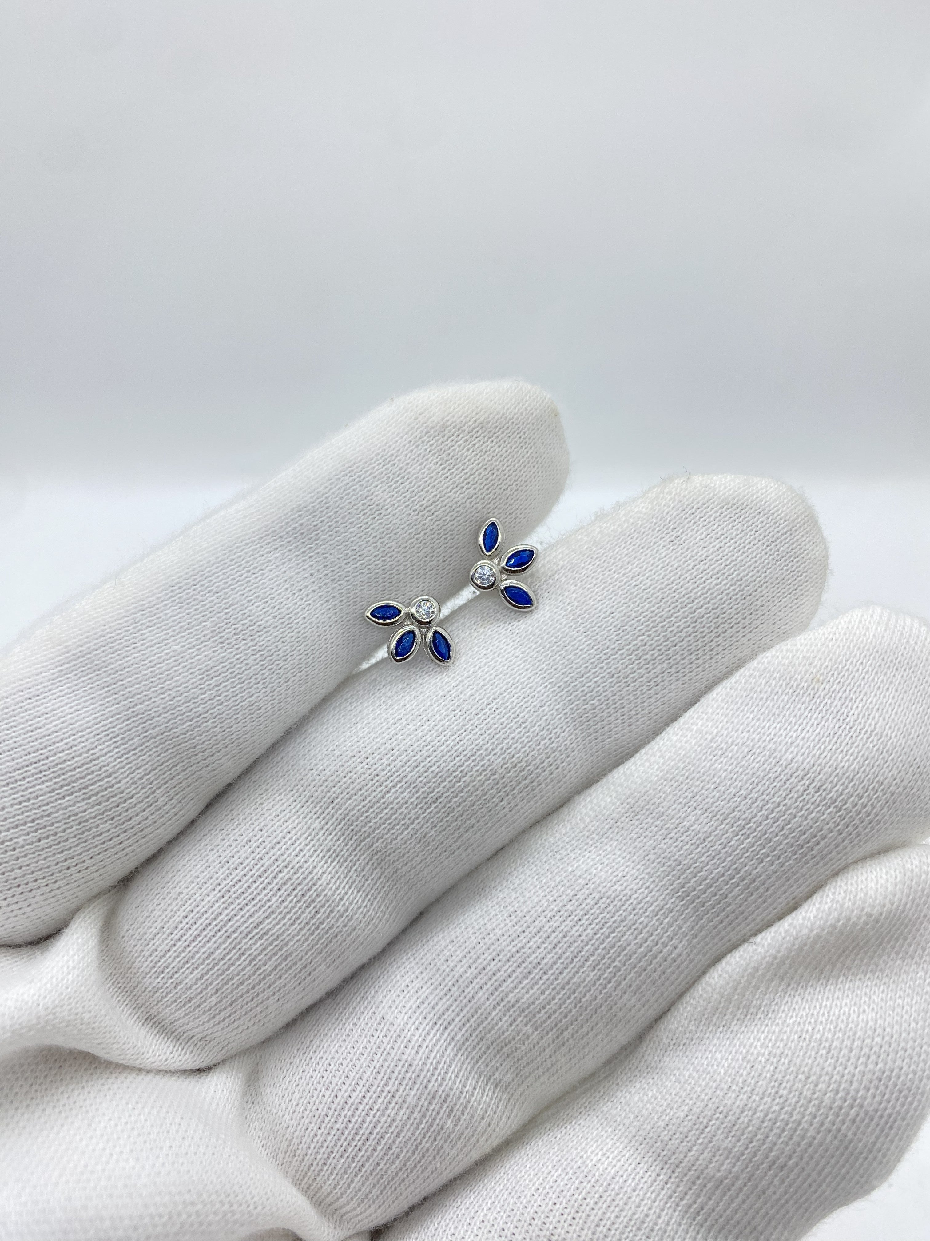 Three blue stone half petals earrings
