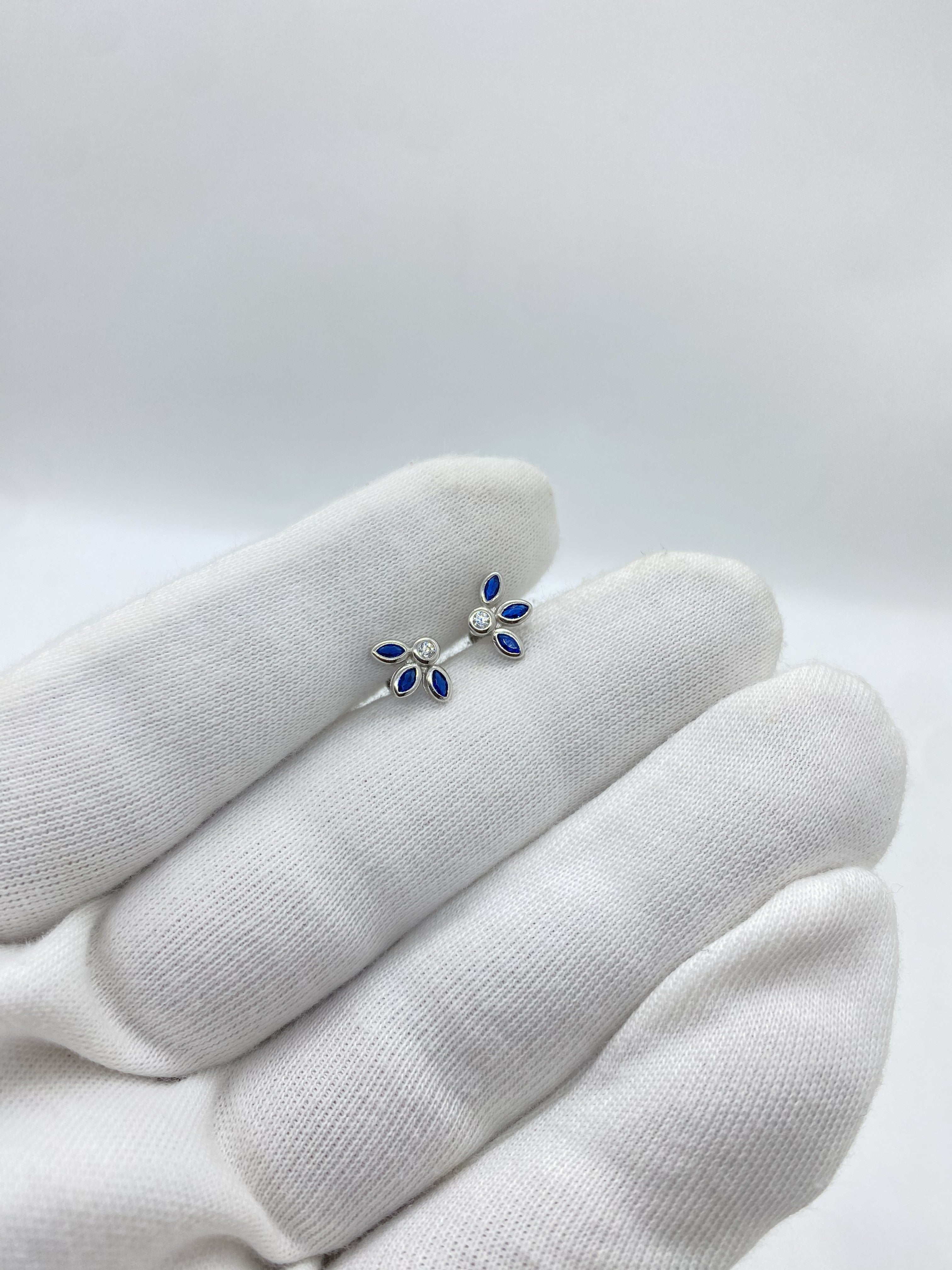 Three blue stone half petals earrings