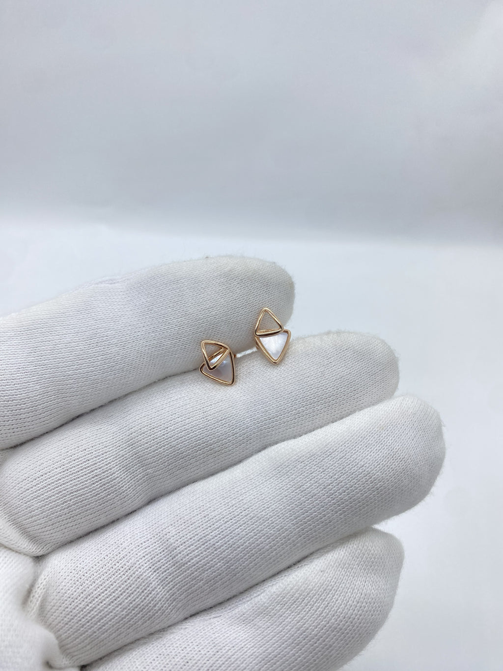Rose gold triangle-shaped earrings