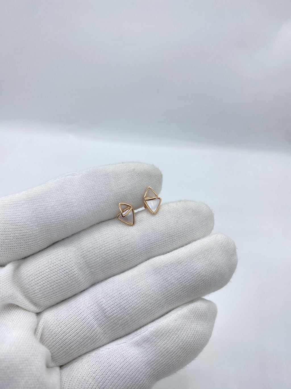 Rose gold triangle-shaped earrings