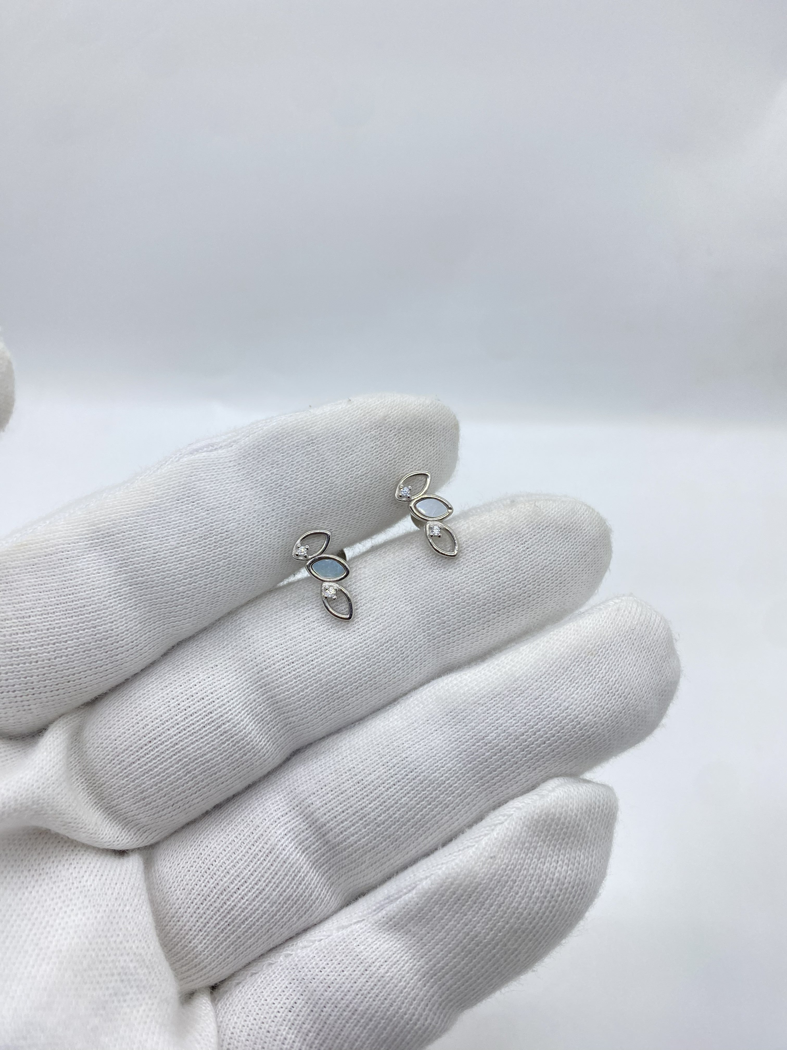 silver earring with beautiful stones