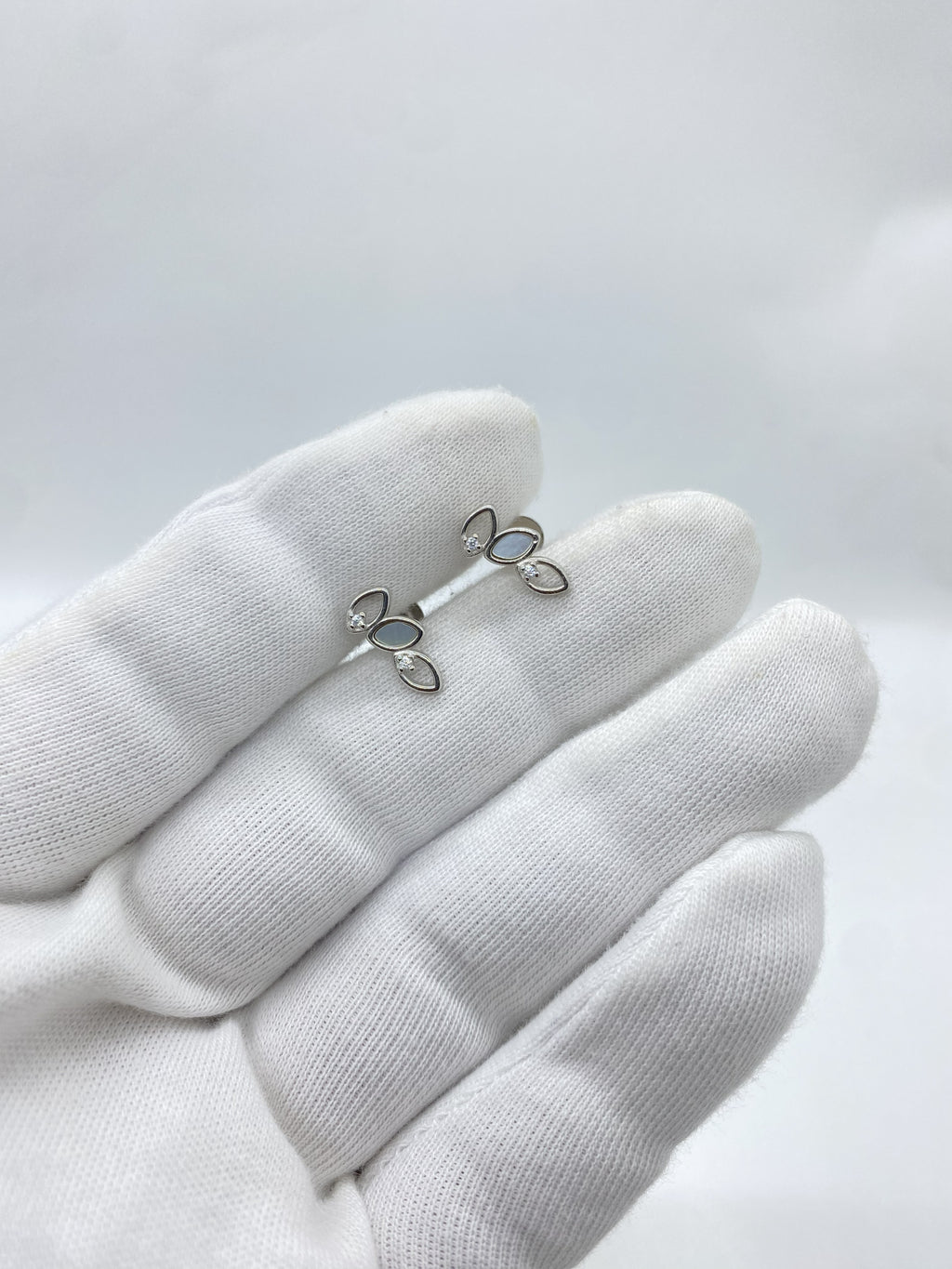 silver earring with beautiful stones