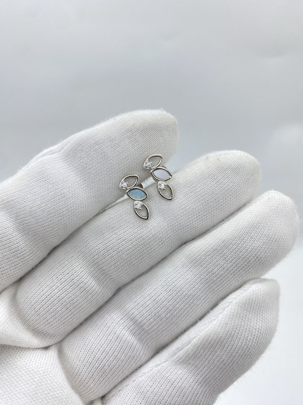 silver earring with beautiful stones